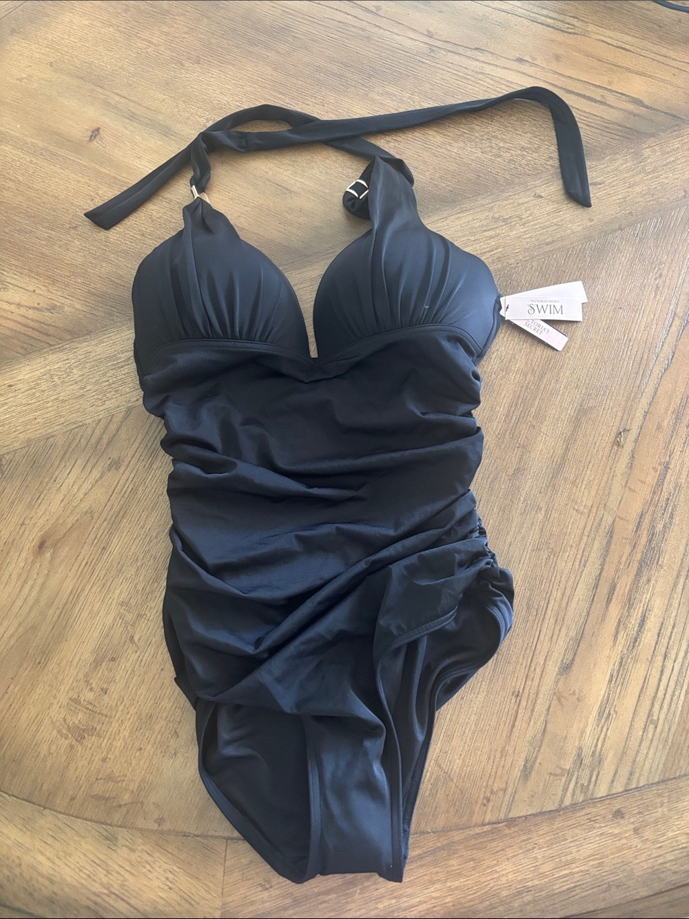 Swimwear tag showing 'SWIM' from Victoria's Secret